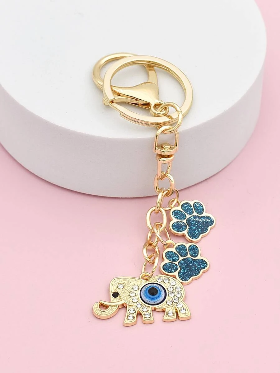 พวงกุญแจ จี้ ช้าง ตกแต่ง ตาปีศาจ & พลอยเทียม  k-055