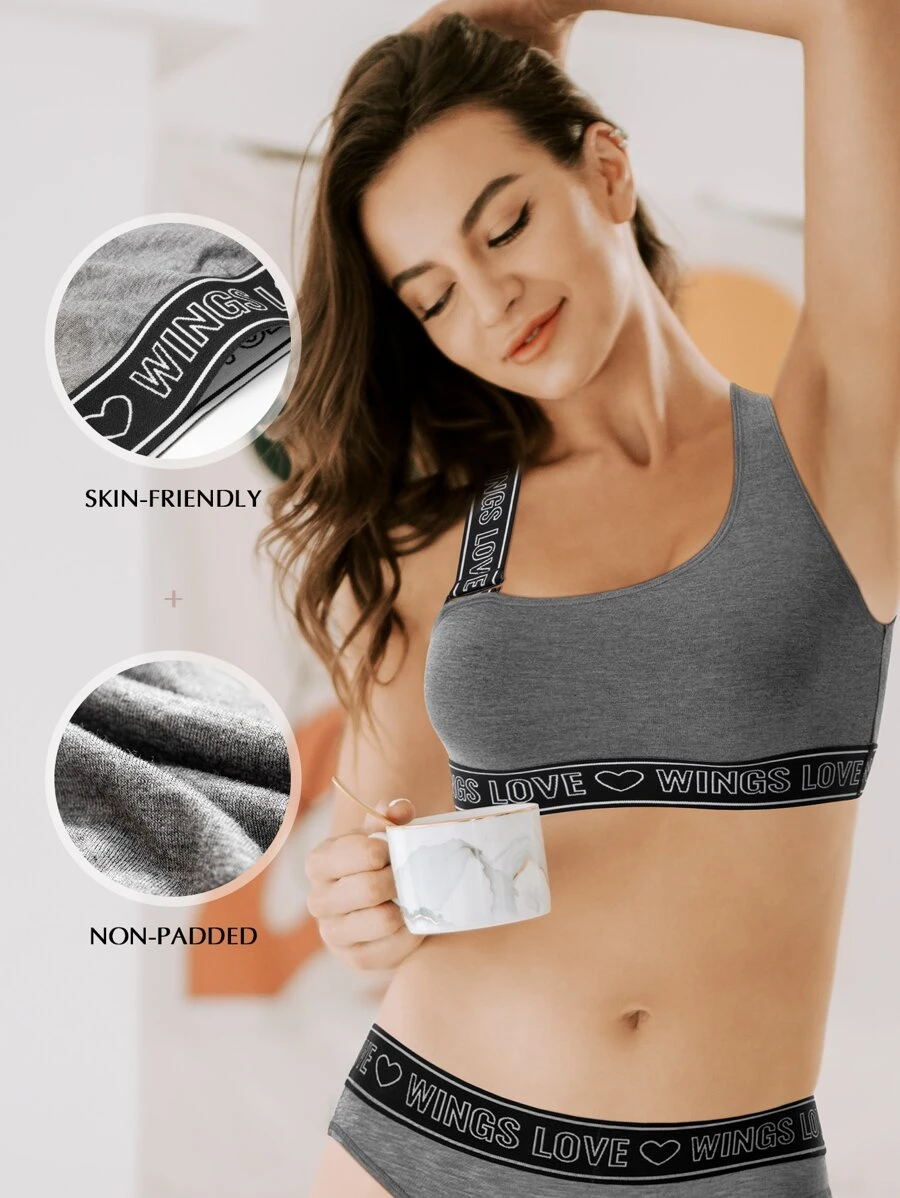 Wingslove สปอร์ตบรา ซัพพอร์ต แต่งแถบ ลายตัวอักษร  aa-86