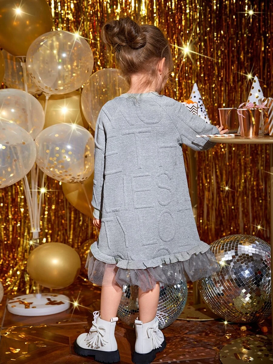 เดรส เสื้อสวมหัว เด็กเล็กผู้หญิง ลายตัวอักษร แขนแรกแลน ผ้าโปร่ง ชายระบาย a-51