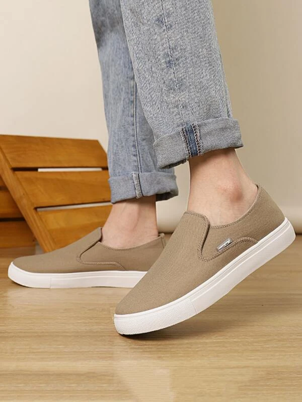 รองเท้าผ้าใบผู้ชาย เรียบง่าย m-79