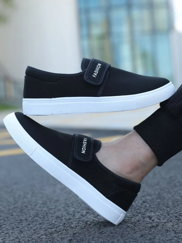 รองเท้าแคนวาส ผู้ชาย ลายตัวอักษร แถบหนามเตย m-75